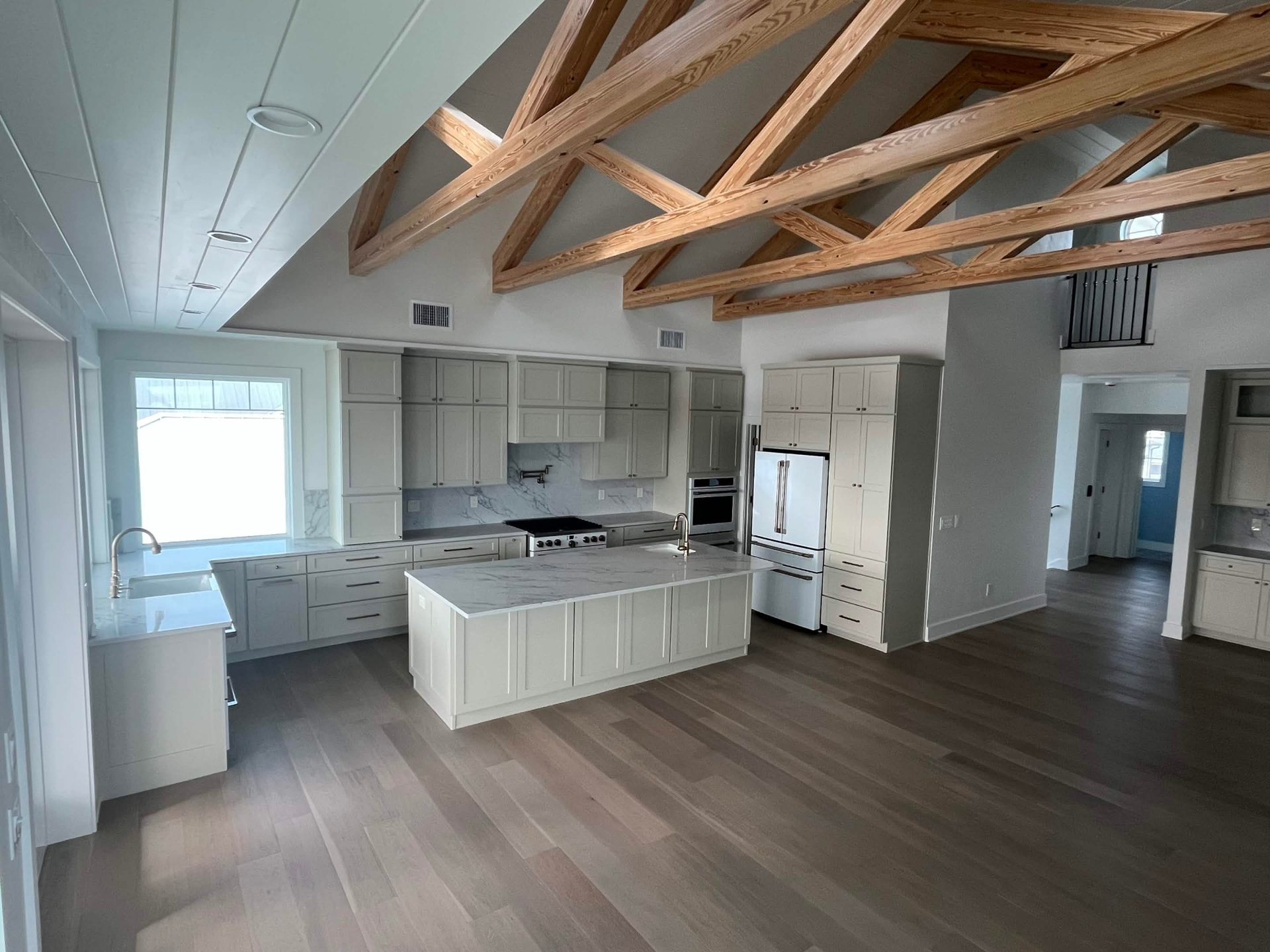 Great Room Kitchen with Timber Trusses — Custom Build